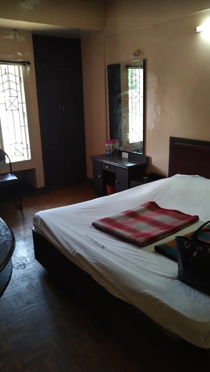 Premium room with dresser mirror and large windows